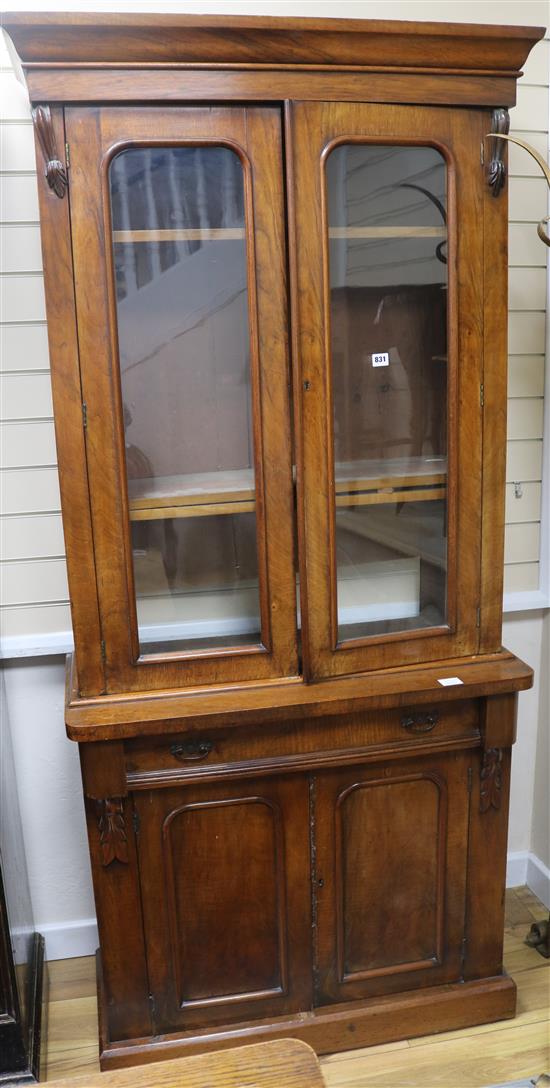 A Victorian walnut bookcase cupboard, H.203cm